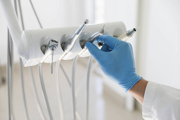 Professional Tooth Extraction technician working in Gridley, IL